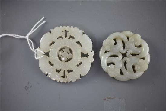 Two Chinese pale celadon jade bi discs, 18th/19th century, 5.4cm,